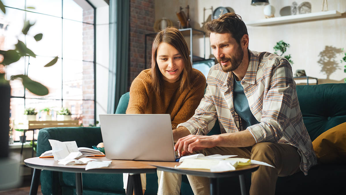 couple looking at a laptop